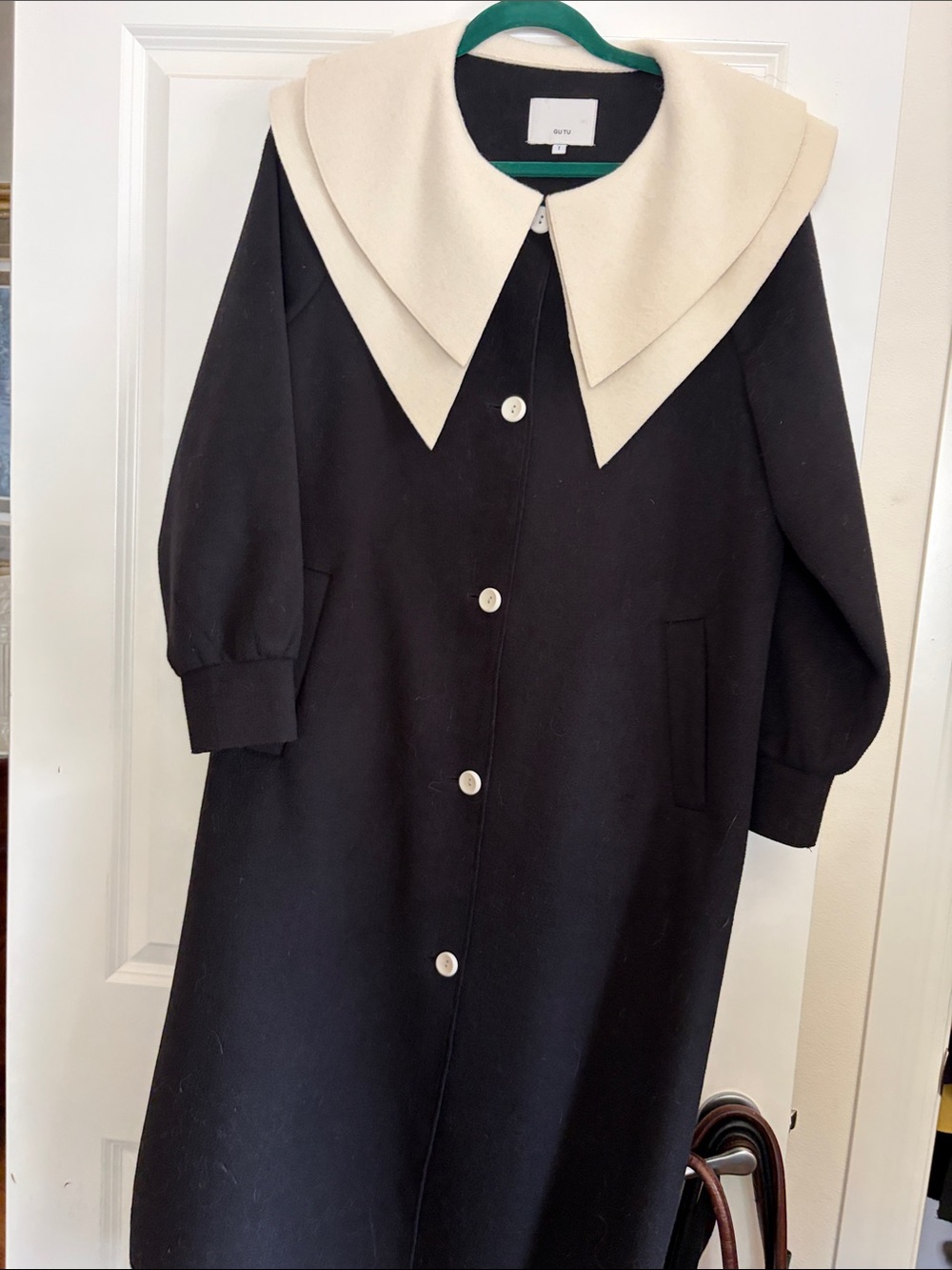 Black Coat with Oversized Cream Collar